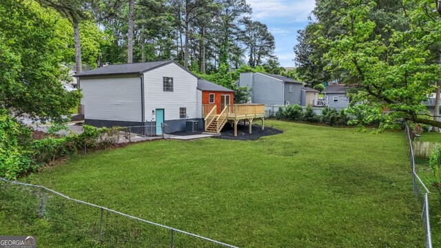 1355 Tucker Woods Dr, Norcross, GA 30093 - rear view of house featuring stairs, a deck, and central AC