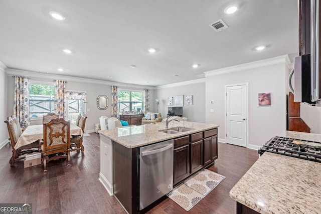 kitchen with stainless steel appliances, a sink, crown molding, baseboards, and dark brown cabinets