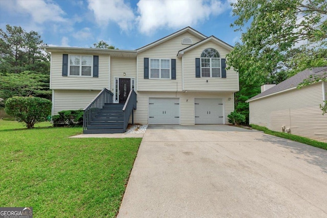 2880 Field Spring Dr, Lithonia, GA 30058 - split foyer home with an attached garage, driveway, and a front yard