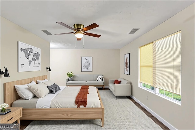 2880 Field Spring Dr, Lithonia, GA 30058 - bedroom featuring a ceiling fan, wood finished floors, and baseboards