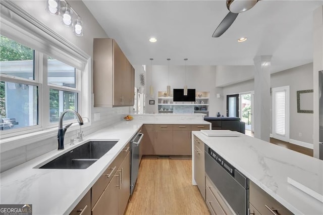 1420 Cortez Ln NE, Atlanta, GA 30319 - kitchen with light wood-style floors, light stone counters, open floor plan, decorative light fixtures, and recessed lighting