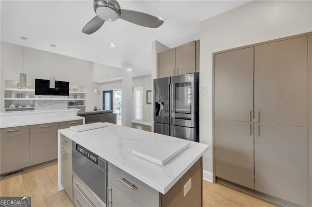 1420 Cortez Ln NE, Atlanta, GA 30319 - kitchen featuring stainless steel fridge with ice dispenser, gray cabinetry, a ceiling fan, a center island, and light wood-style flooring