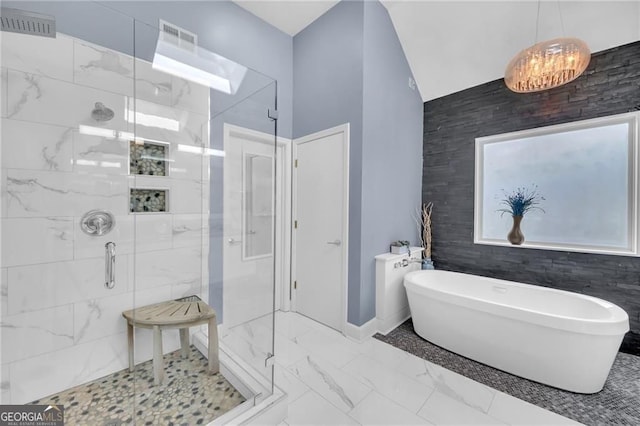 1420 Cortez Ln NE, Atlanta, GA 30319 - bathroom featuring a shower stall, a soaking tub, and marble finish floors