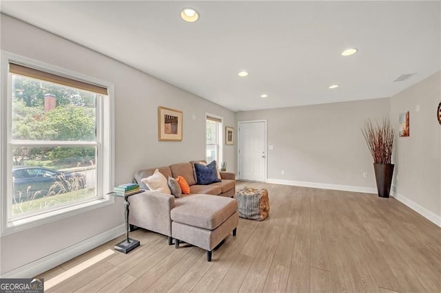 1420 Cortez Ln NE, Atlanta, GA 30319 - living room with light wood finished floors and recessed lighting