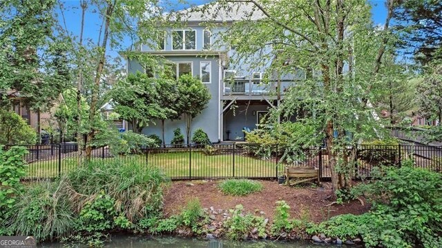 1420 Cortez Ln NE, Atlanta, GA 30319 - rear view of house featuring stucco siding