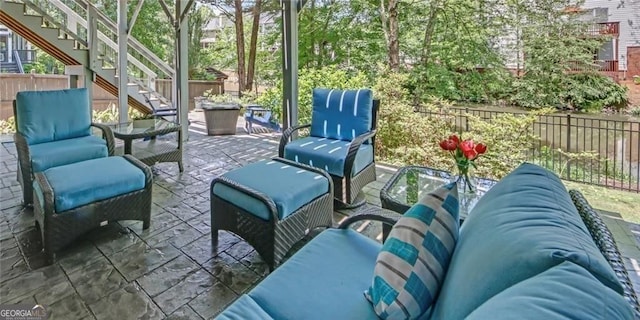 1420 Cortez Ln NE, Atlanta, GA 30319 - fenced backyard with stairs, a patio area, and an outdoor hangout area