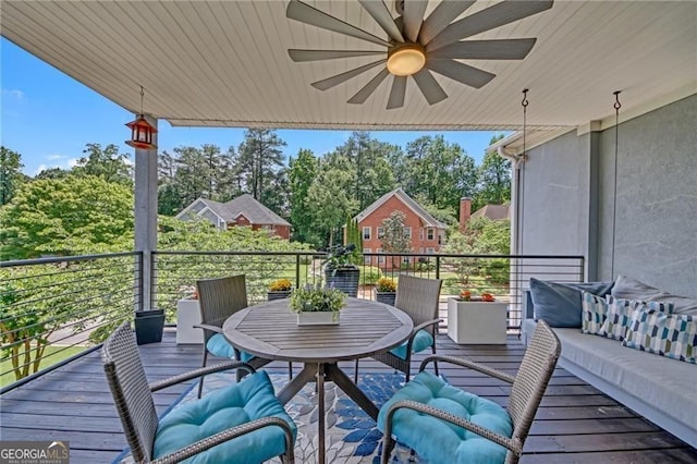 1420 Cortez Ln NE, Atlanta, GA 30319 - wooden terrace featuring ceiling fan and view of wooded area