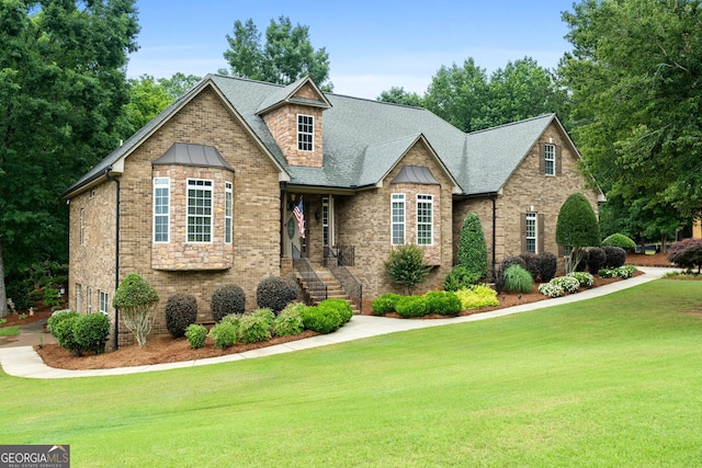 124 Belford Way, Locust Grove, GA 30233 - craftsman-style house featuring a front lawn, brick siding, a shingled roof, and stone siding