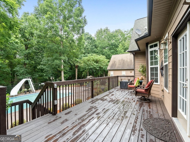 124 Belford Way, Locust Grove, GA 30233 - wooden deck featuring view of wooded area