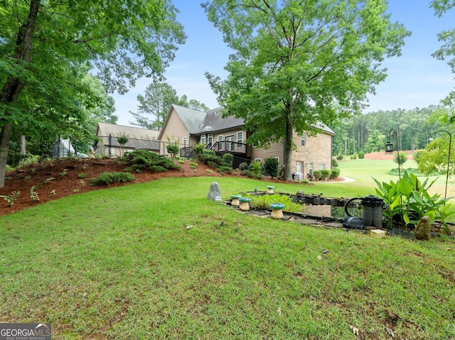 124 Belford Way, Locust Grove, GA 30233 - view of grassy yard