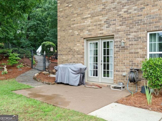 124 Belford Way, Locust Grove, GA 30233 - view of patio with french doors and area for grilling