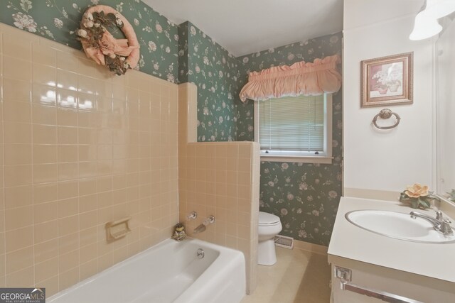 154 Willowdell Dr, Toccoa, GA 30577 - bathroom with wallpapered walls, toilet, vanity, and tile patterned flooring