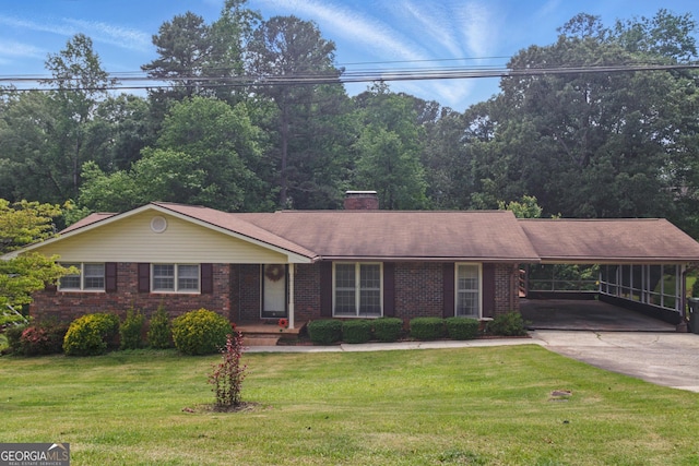 154 Willowdell Dr, Toccoa, GA 30577 - ranch-style house with concrete driveway, brick siding, a chimney, a front lawn, and a carport