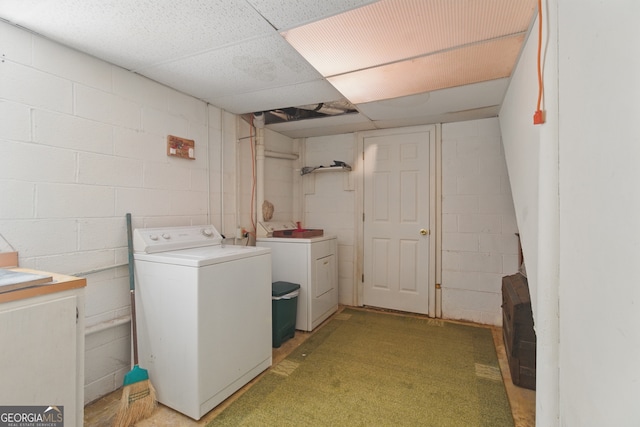 154 Willowdell Dr, Toccoa, GA 30577 - clothes washing area featuring concrete block wall and washer and clothes dryer