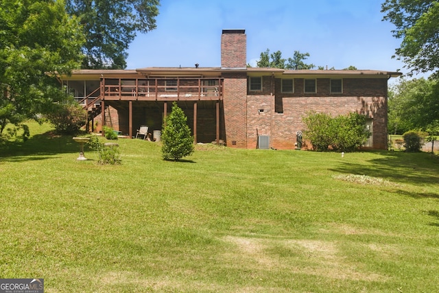 154 Willowdell Dr, Toccoa, GA 30577 - rear view of property featuring stairway, a chimney, a deck, and a lawn