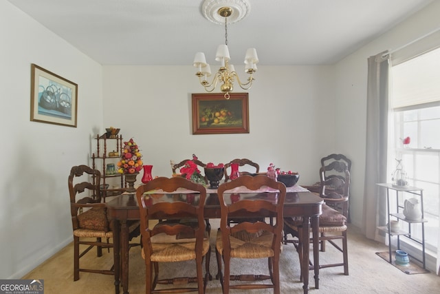 154 Willowdell Dr, Toccoa, GA 30577 - dining space featuring light colored carpet and a chandelier