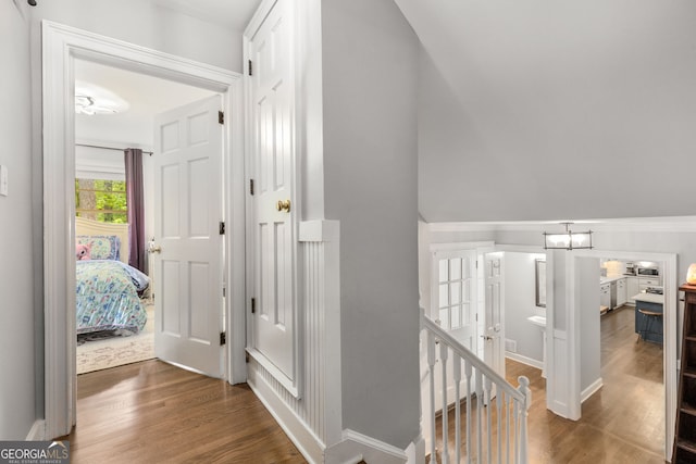 504 Kingswood Ln NW, Atlanta, GA 30305 - hallway featuring an upstairs landing, wood finished floors, and baseboards