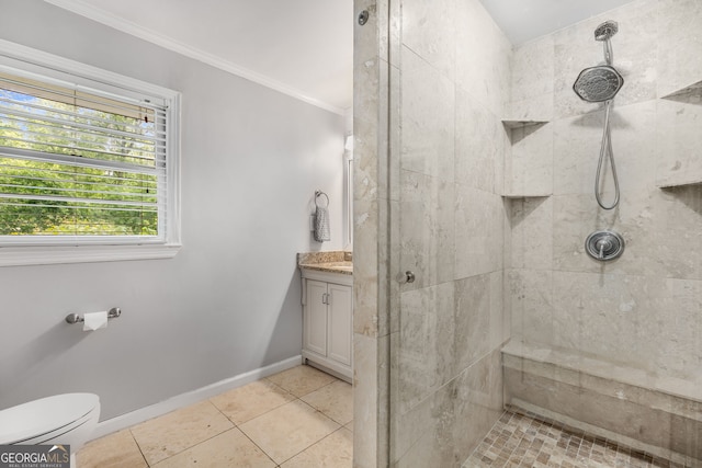 504 Kingswood Ln NW, Atlanta, GA 30305 - bathroom featuring tiled shower, vanity, ornamental molding, toilet, and tile patterned flooring
