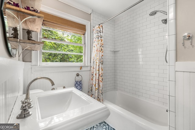 504 Kingswood Ln NW, Atlanta, GA 30305 - bathroom with a sink, shower / bathtub combination with curtain, and wainscoting