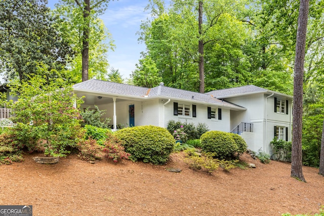 504 Kingswood Ln NW, Atlanta, GA 30305 - view of front of home featuring brick siding and roof with shingles