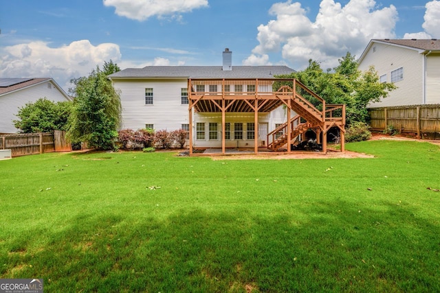 6391 Compass Dr, Flowery Branch, GA 30542 - back of house featuring a deck, a fenced backyard, a chimney, and stairs
