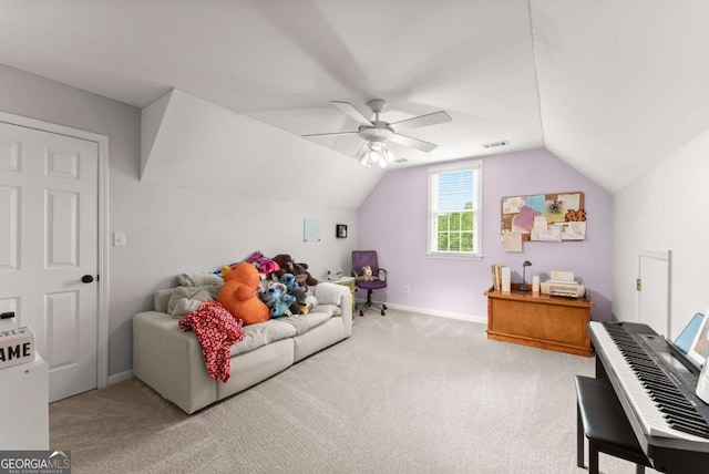 1721 Mulberry Lake Dr, Dacula, GA 30019 - carpeted living room with vaulted ceiling, a ceiling fan, and baseboards