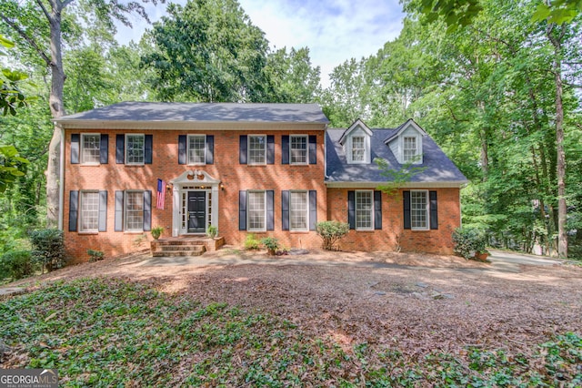 3741 Windhurst Dr SW, Lilburn, GA 30047 - colonial inspired home with brick siding