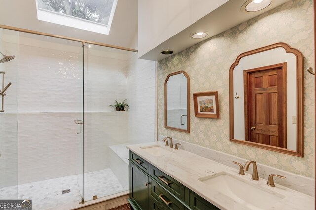 3741 Windhurst Dr SW, Lilburn, GA 30047 - full bath with a shower stall, wallpapered walls, double vanity, and a skylight