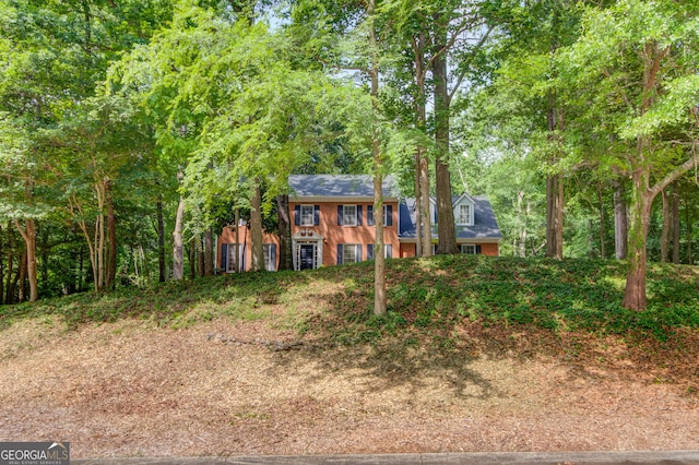 3741 Windhurst Dr SW, Lilburn, GA 30047 - view of colonial inspired home
