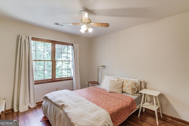 3741 Windhurst Dr SW, Lilburn, GA 30047 - bedroom featuring wood finished floors, baseboards, and ceiling fan