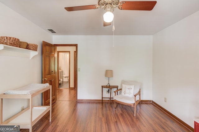3741 Windhurst Dr SW, Lilburn, GA 30047 - sitting room with ceiling fan, wood finished floors, and baseboards