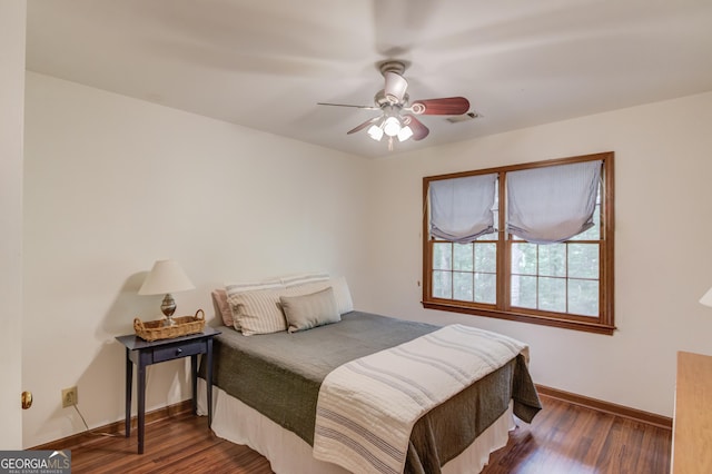 3741 Windhurst Dr SW, Lilburn, GA 30047 - bedroom featuring wood finished floors, baseboards, and ceiling fan