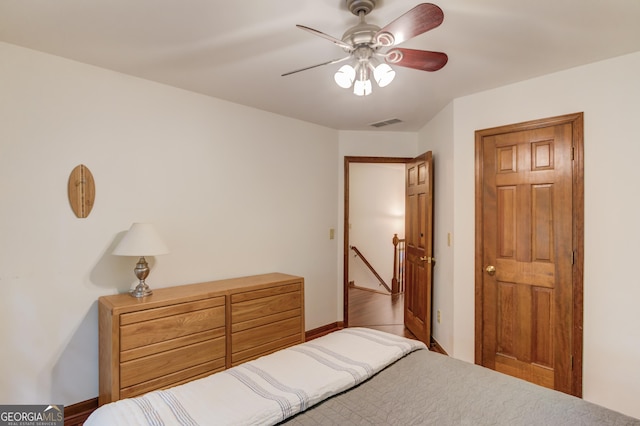 3741 Windhurst Dr SW, Lilburn, GA 30047 - bedroom featuring baseboards and a ceiling fan