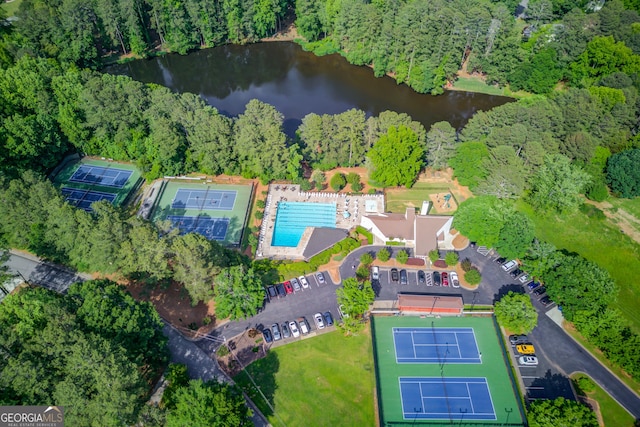 3741 Windhurst Dr SW, Lilburn, GA 30047 - aerial overview of property's location with a nearby body of water and a forest