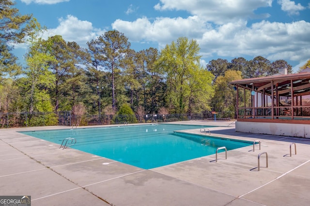3741 Windhurst Dr SW, Lilburn, GA 30047 - community pool featuring fence and a patio area
