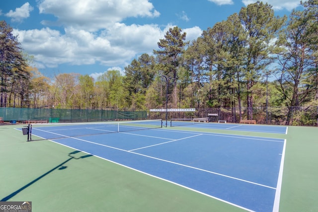 3741 Windhurst Dr SW, Lilburn, GA 30047 - view of tennis court featuring community basketball court and fence