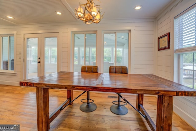 22 Waters Bridge Cir, Covington, GA 30014 - dining room featuring french doors, a chandelier, crown molding, recessed lighting, and light wood finished floors