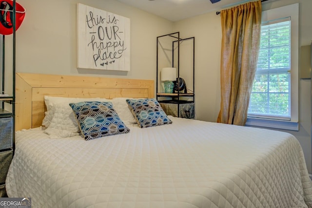 22 Waters Bridge Cir, Covington, GA 30014 - bedroom featuring multiple windows