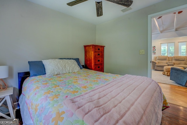 22 Waters Bridge Cir, Covington, GA 30014 - bedroom featuring wood finished floors and ceiling fan