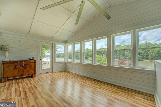 22 Waters Bridge Cir, Covington, GA 30014 - sunroom featuring wood finished floors, wood walls, and a water view