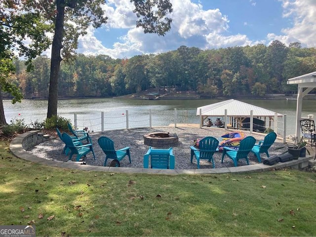 22 Waters Bridge Cir, Covington, GA 30014 - water view featuring an outdoor fire pit, a forest, and a gazebo