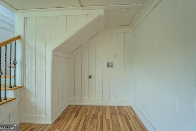 22 Waters Bridge Cir, Covington, GA 30014 - interior space with light wood-style floors, hookup for an electric dryer, and wooden walls