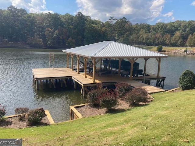 22 Waters Bridge Cir, Covington, GA 30014 - dock with a water view, a lawn, a view of trees, and boat lift