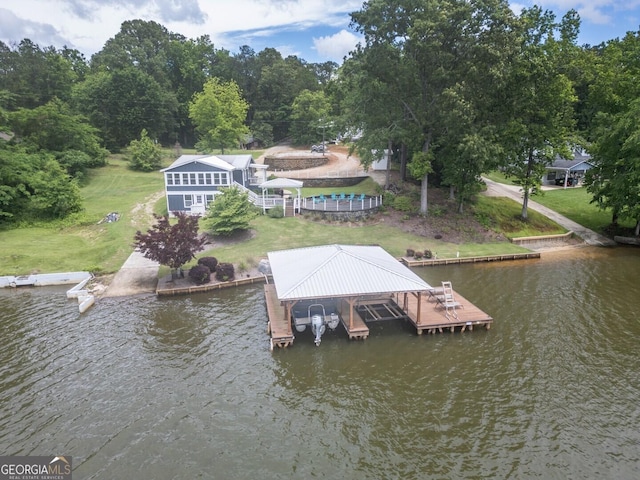 22 Waters Bridge Cir, Covington, GA 30014 - dock area with boat lift and a water view