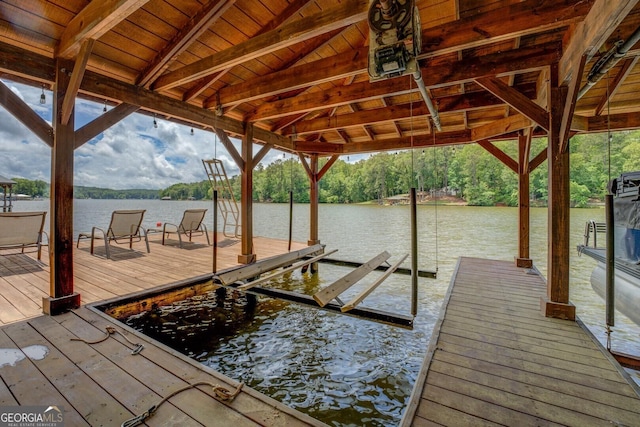22 Waters Bridge Cir, Covington, GA 30014 - dock area featuring a water view and boat lift