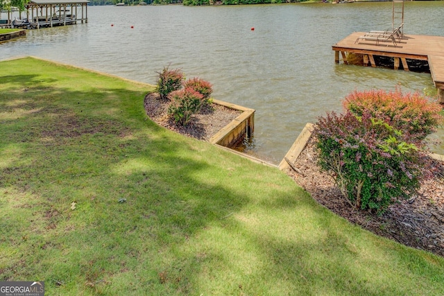 22 Waters Bridge Cir, Covington, GA 30014 - dock featuring a water view and a yard
