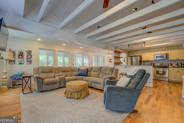 22 Waters Bridge Cir, Covington, GA 30014 - living area featuring beamed ceiling, light wood finished floors, and recessed lighting