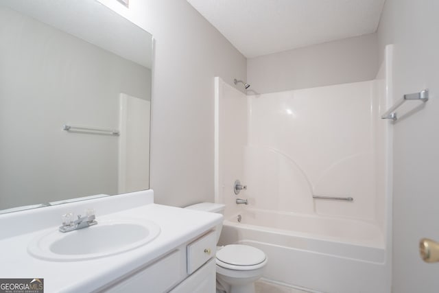 4915 Truitt Ln, Decatur, GA 30035 - bathroom featuring vanity, tub / shower combination, and a textured ceiling