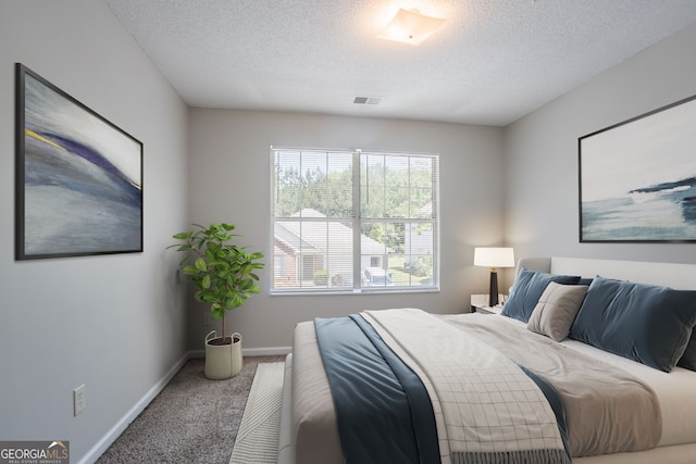 4915 Truitt Ln, Decatur, GA 30035 - carpeted bedroom featuring a textured ceiling and baseboards