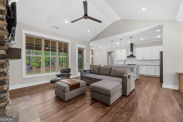 212 Bush Creek Way, Bremen, GA 30110 - living area with a ceiling fan, dark wood-style flooring, vaulted ceiling, recessed lighting, and baseboards